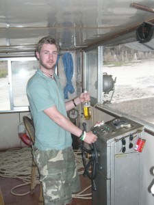 The captain letting me have a go