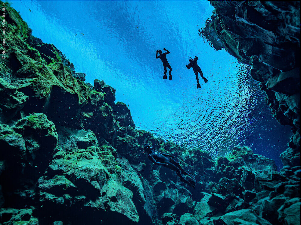 Snorkeling In Iceland Between The Tectonic Plates At The Silfra Fissure 