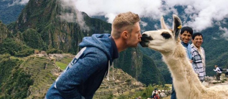 Kissing a llama at Machu Picchu