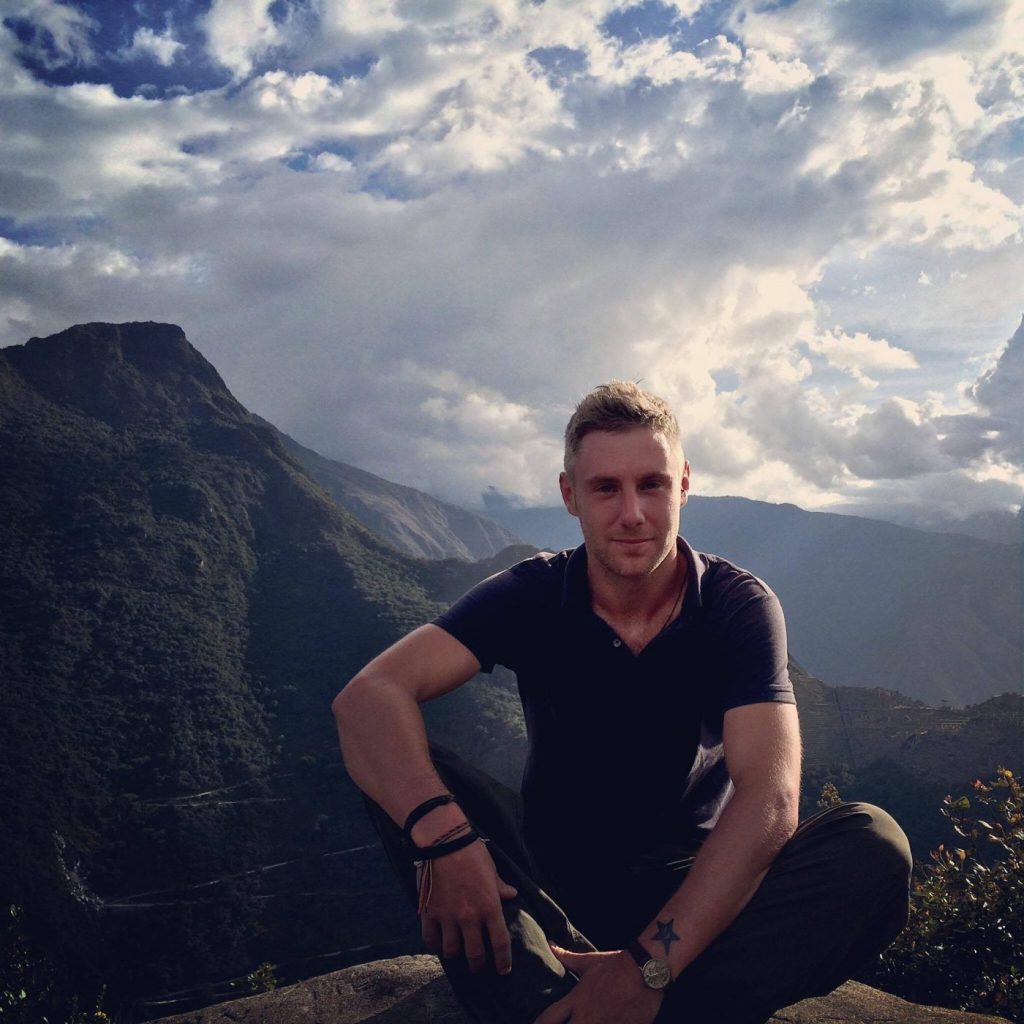 At the top of Putucusi Mountain