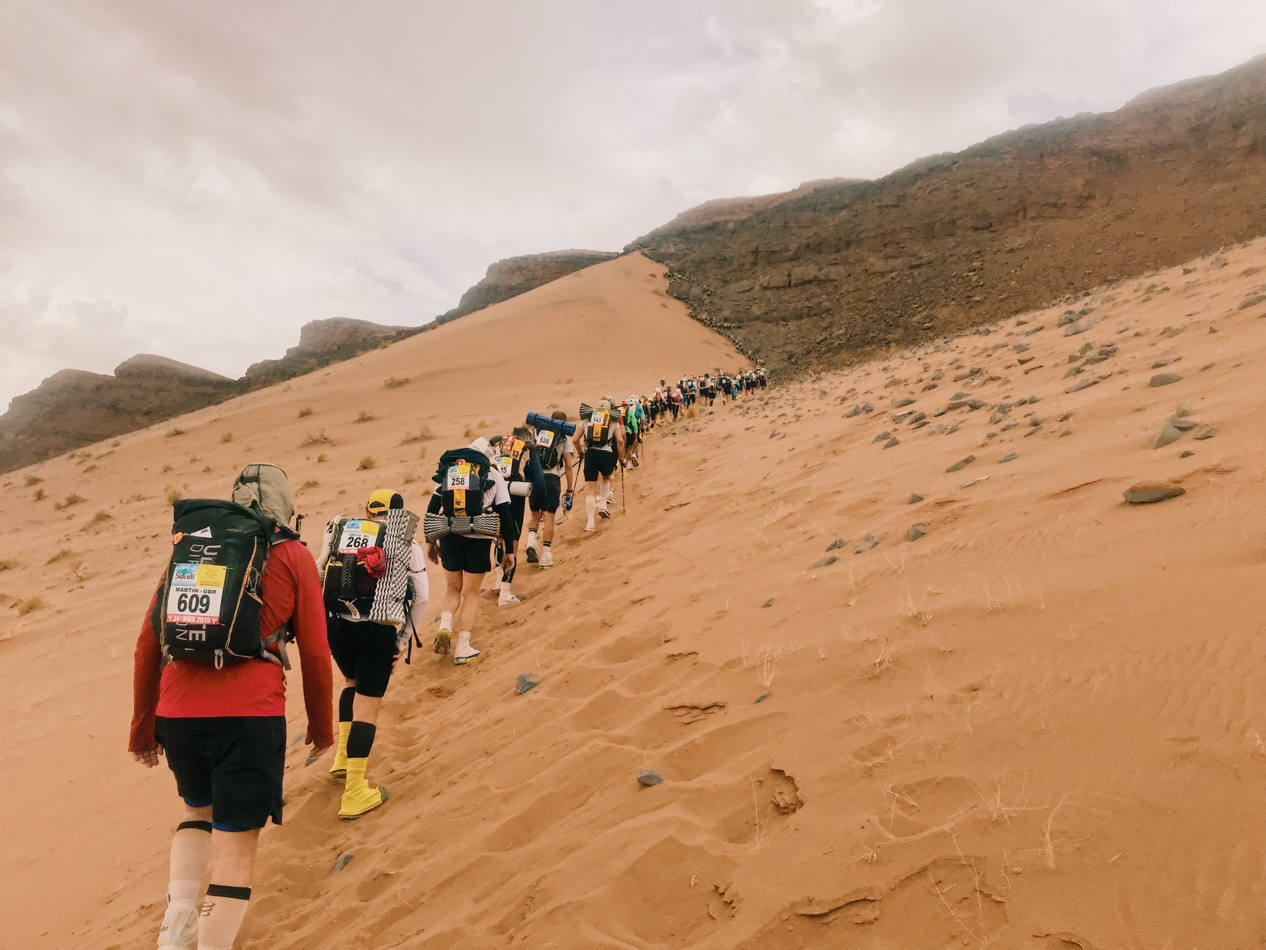 Climbing a huge sand dune